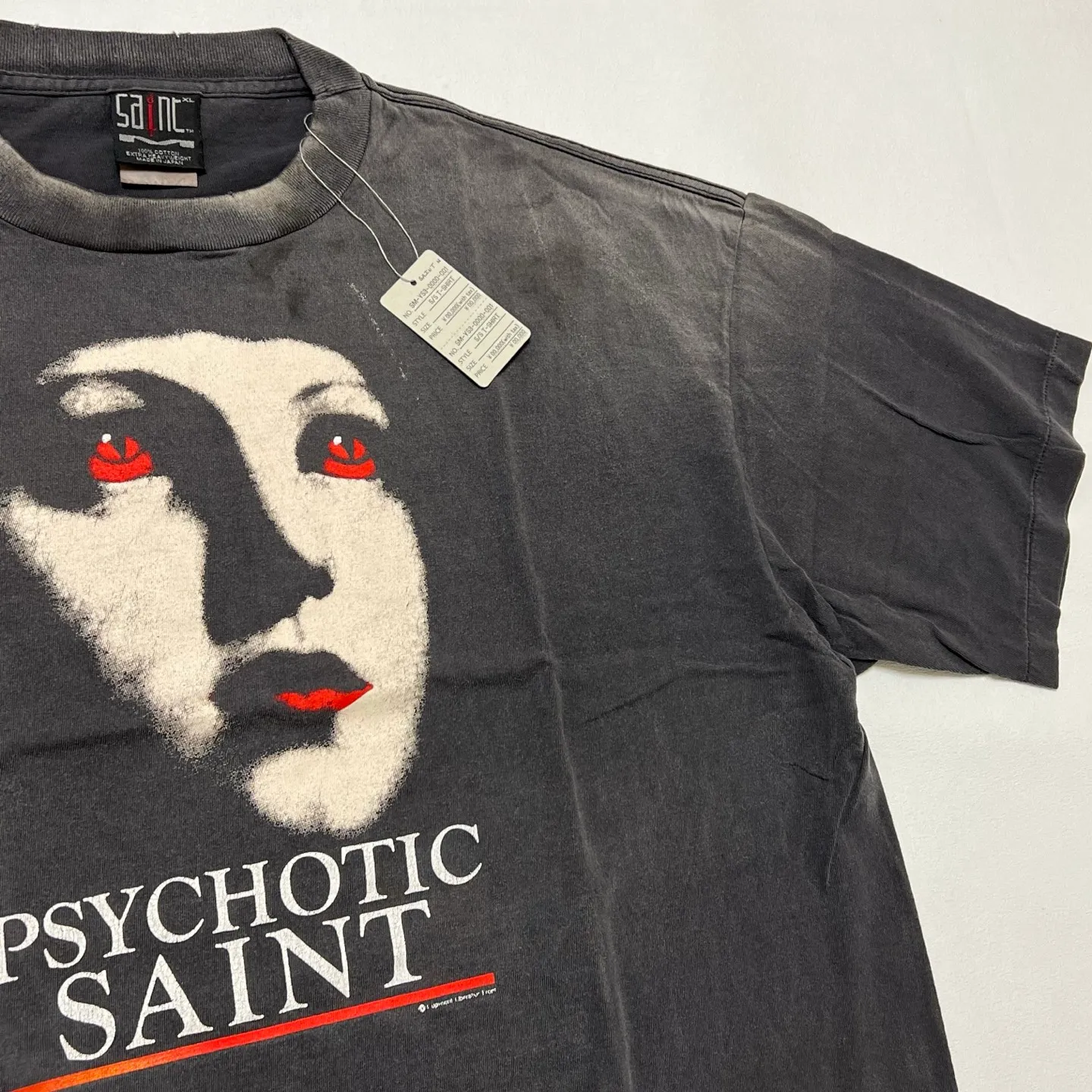 SAINT Mxxxxxx SS TEE/PSYCHOTIC SNT/BLK Gothic heavy metal rock style retro short-sleeved Mysterious woman's face printed distressed TEE Washed black S-XL Same as the original version Cylindrical side seam OE yarn fabric Garment dyeing Faded by heavy washing Bust plaster faded Correct version Matching of original accessories